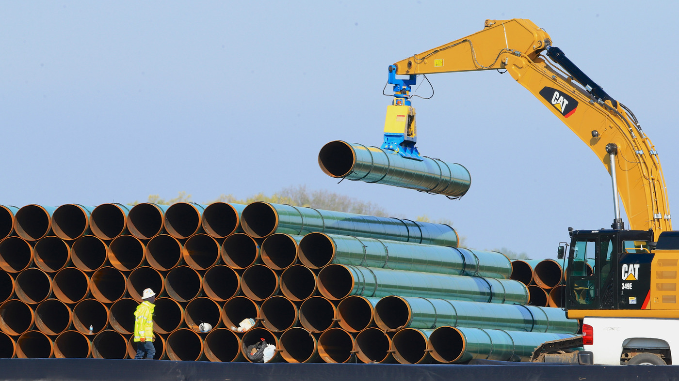 Pipes for the Dakota Access Pipeline are stacked at a staging area in Worthing, S.D., in 2015.