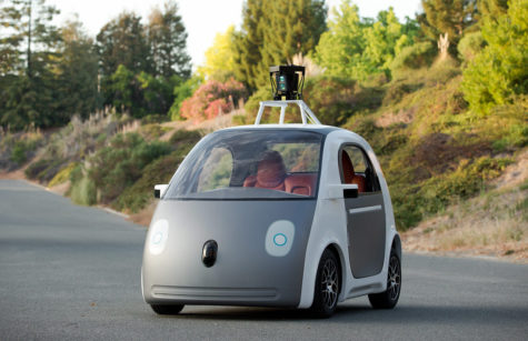 This image provided by Google shows a very early version of Googles prototype self-driving car. The two-seater wont be sold publicly, but Google on Tuesday, May 27, 2014 said it hopes by this time next year, 100 prototypes will be on public roads. (AP Photo/Google)