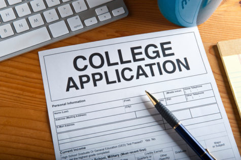 Blank college application on a desktop. Artwork created by the photographer.